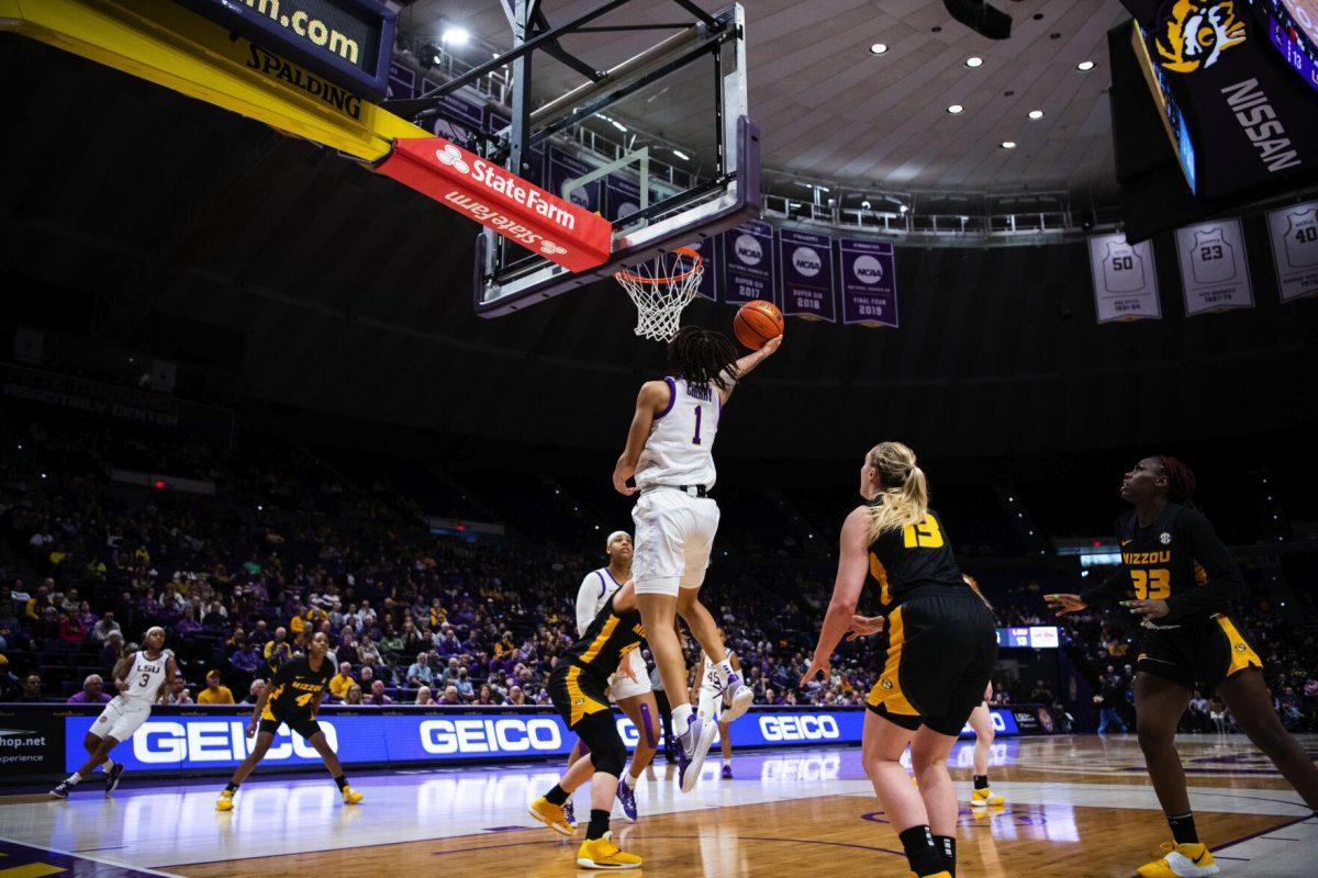 LSU women’s basketball graduate student guard Jailin Cherry (1) shoots a layup Thursday, Jan. 13, 2022, during LSU’s 87-85 overtime win against Missouri in the Pete Maravich Assembly Center on North Stadium Drive in Baton Rouge, La.