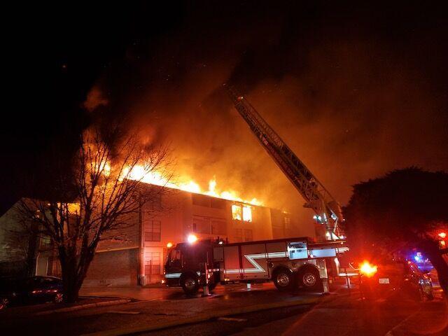 Baton Rouge firefighters respond to a large apartment fire at the Bradshaw Apartment Homes Friday night.&#160;