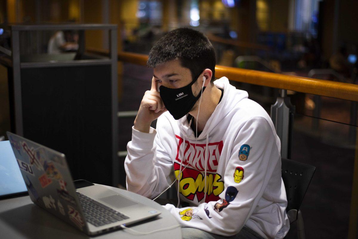 LSU sports administration major sophomore Kenneth Remedies does his online Zoom class on Monday, Jan. 25, 2021 in the Student Union on LSU's campus.