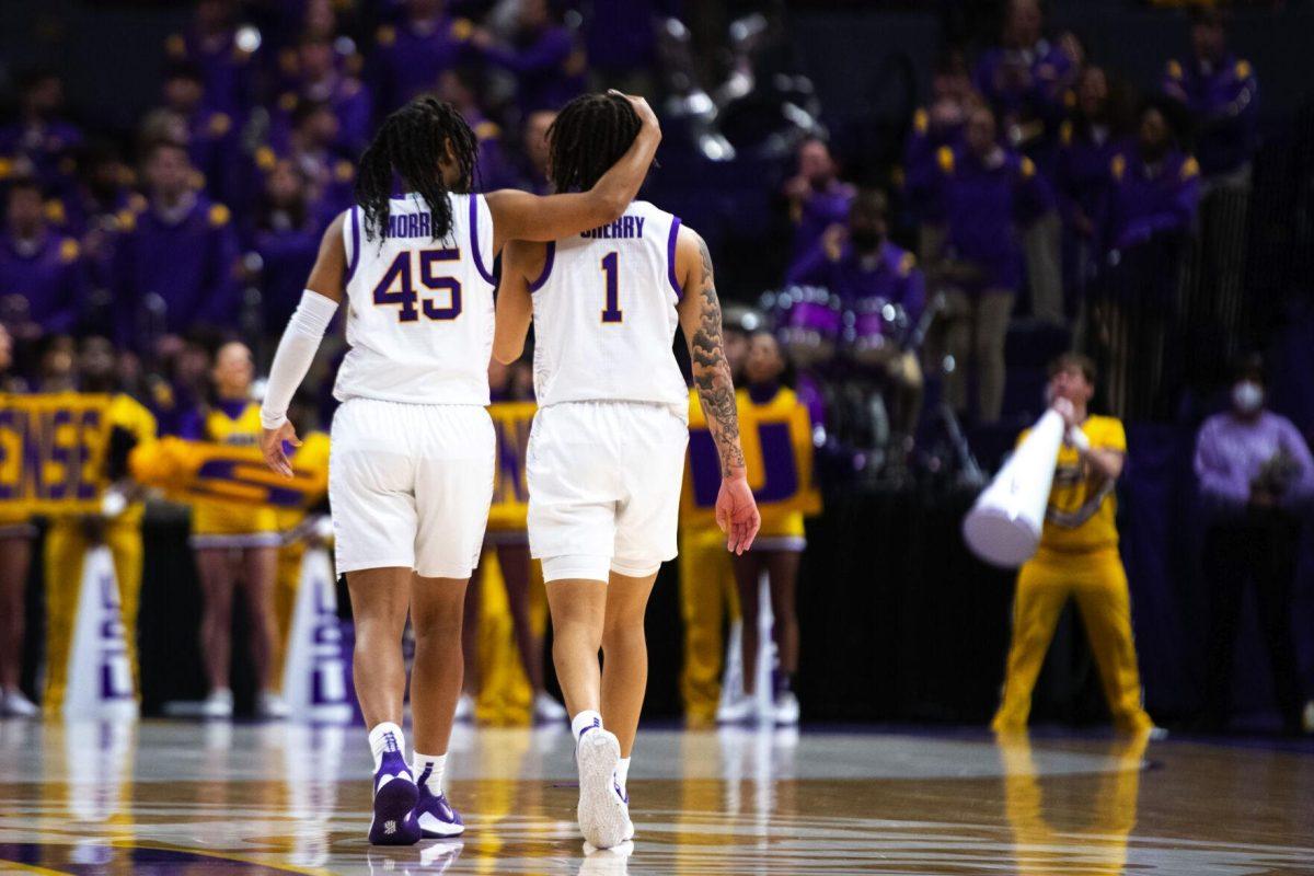 LSU women’s basketball senior guard Alexis Morris (45) wraps her arm around graduate student guard Jailin Cherry (1) Thursday, Jan. 13, 2022, during LSU’s 87-85 overtime win against Missouri in the Pete Maravich Assembly Center on North Stadium Drive in Baton Rouge, La.