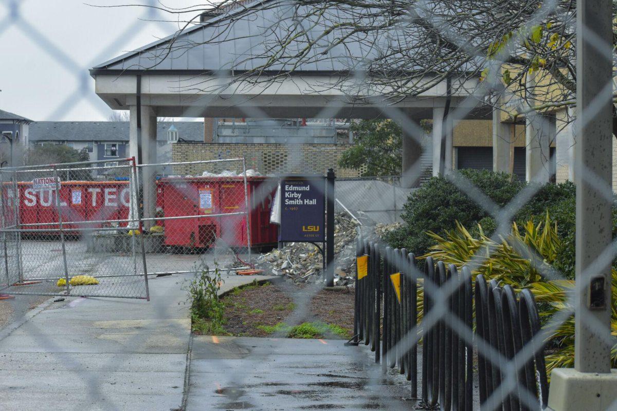 Edmund Kirby Smith Hall sign sits outside the main entrance surrounded by dumpsters on Monday, Jan. 24, 2022, on Aster Street at LSU.