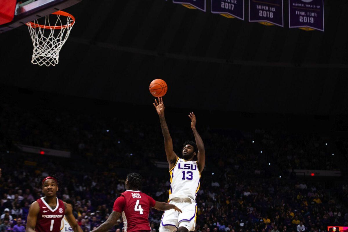 LSU men’s basketball sophomore forward Tari Eason (13) shoots a shot of an Arkansas defender Jan. 15, 2022, during LSU’s 65-58 loss against Arkansas in the Pete Maravich Assembly Center on North Stadium Drive in Baton Rouge, La.