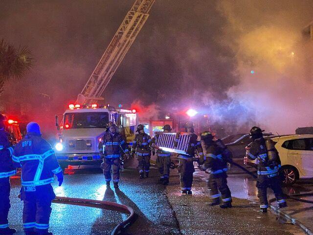 Baton Rouge firefighters respond to a large apartment fire at the Bradshaw Apartment Homes Friday night.&#160;