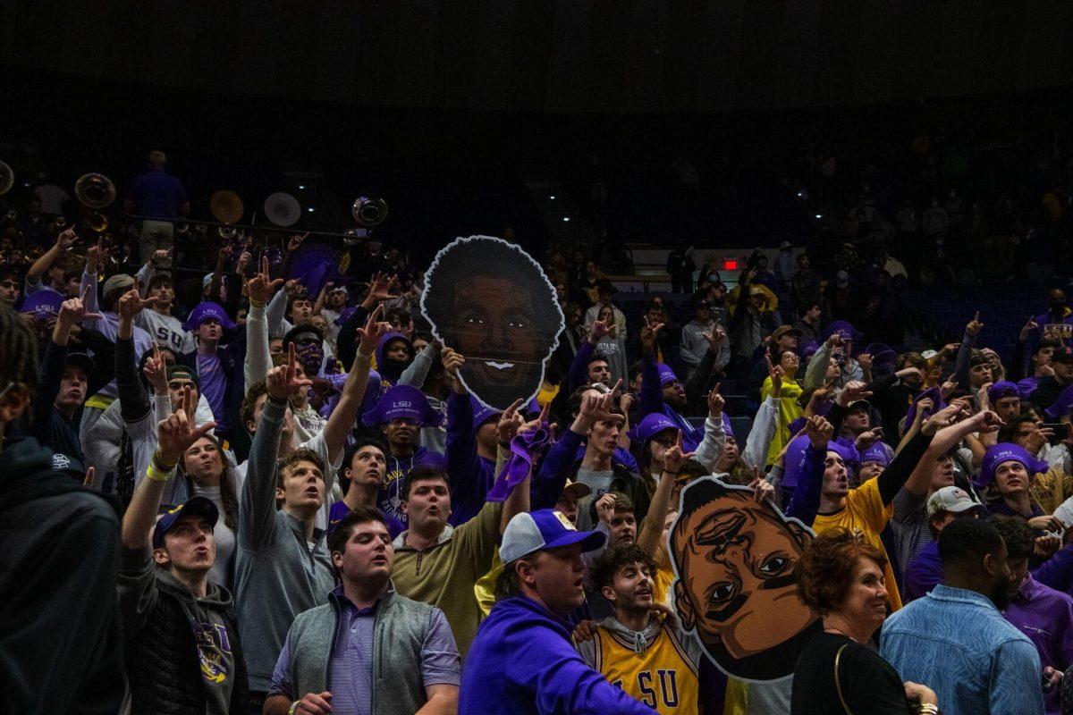 The LSU student section sings the LSU fight song Tuesday, Jan. 04, 2022, during LSU&#8217;s 56-50 win against Kentucky in the Pete Maravich Assembly Center on North Stadium Drive in Baton Rouge, La.