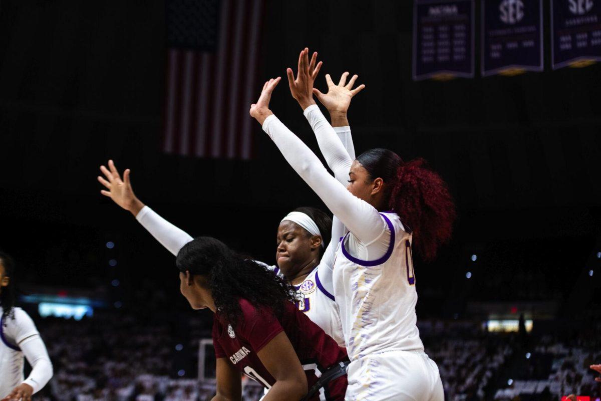 LSU women’s basketball graduate student center Faustine Aifuwa (24) and graduate student forward Autumn Newby (0) trap a South Carolina player Thursday, Jan. 06, 2022, during LSU’s 66-60 loss against South Carolina in the Pete Maravich Assembly Center on North Stadium Drive in Baton Rouge, La.
