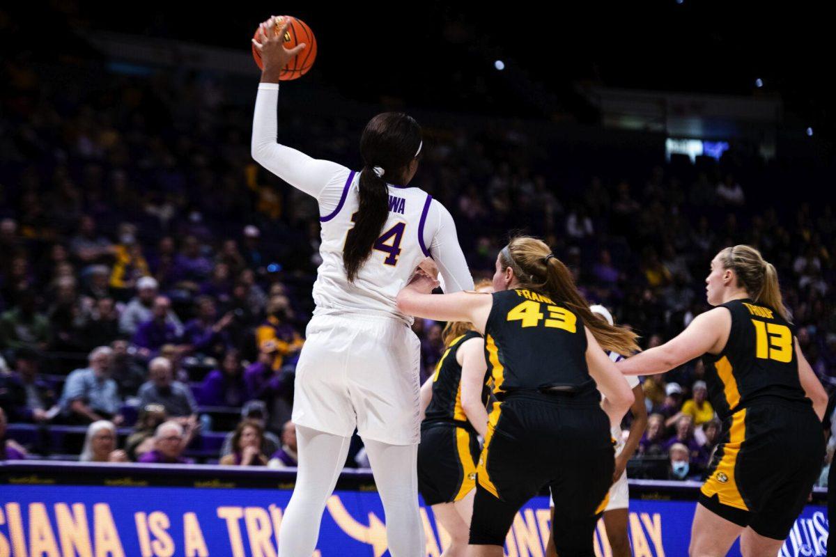 LSU women’s basketball graduate student center Faustine Aifuwa (24) catches a pass Thursday, Jan. 13, 2022, during LSU’s 87-85 overtime win against Missouri in the Pete Maravich Assembly Center on North Stadium Drive in Baton Rouge, La.