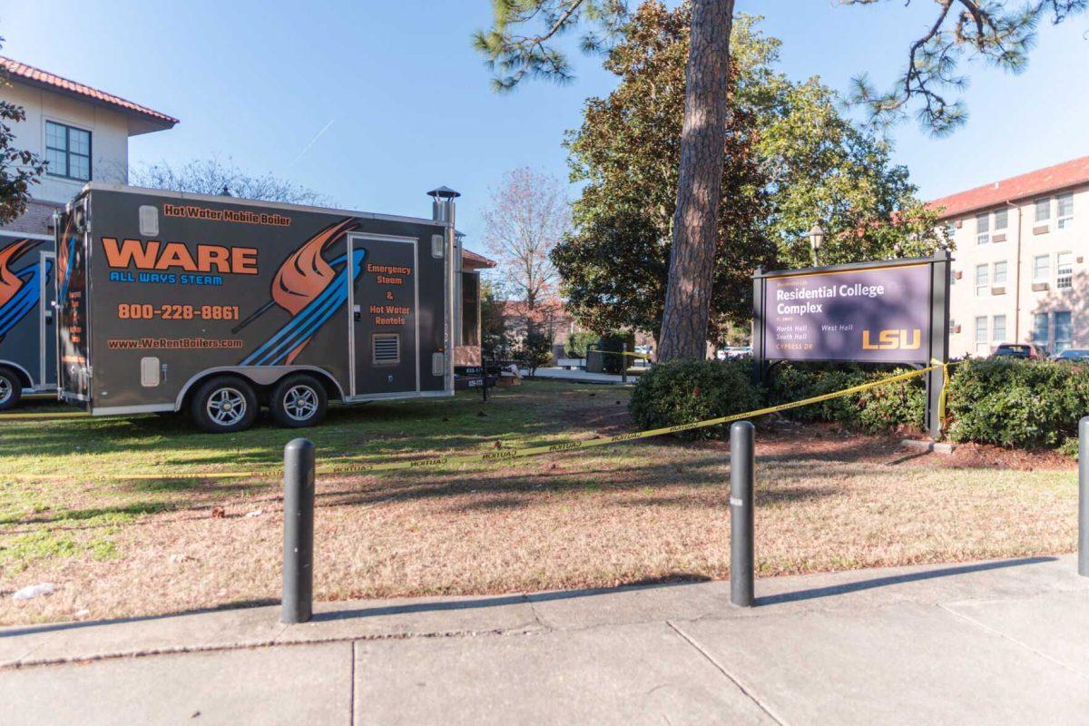 Emergency hot water rental trailers pump hot water on Sunday, Jan. 23, 2022, into the Residential College Complex on Cypress Drive in Baton Rouge, La.