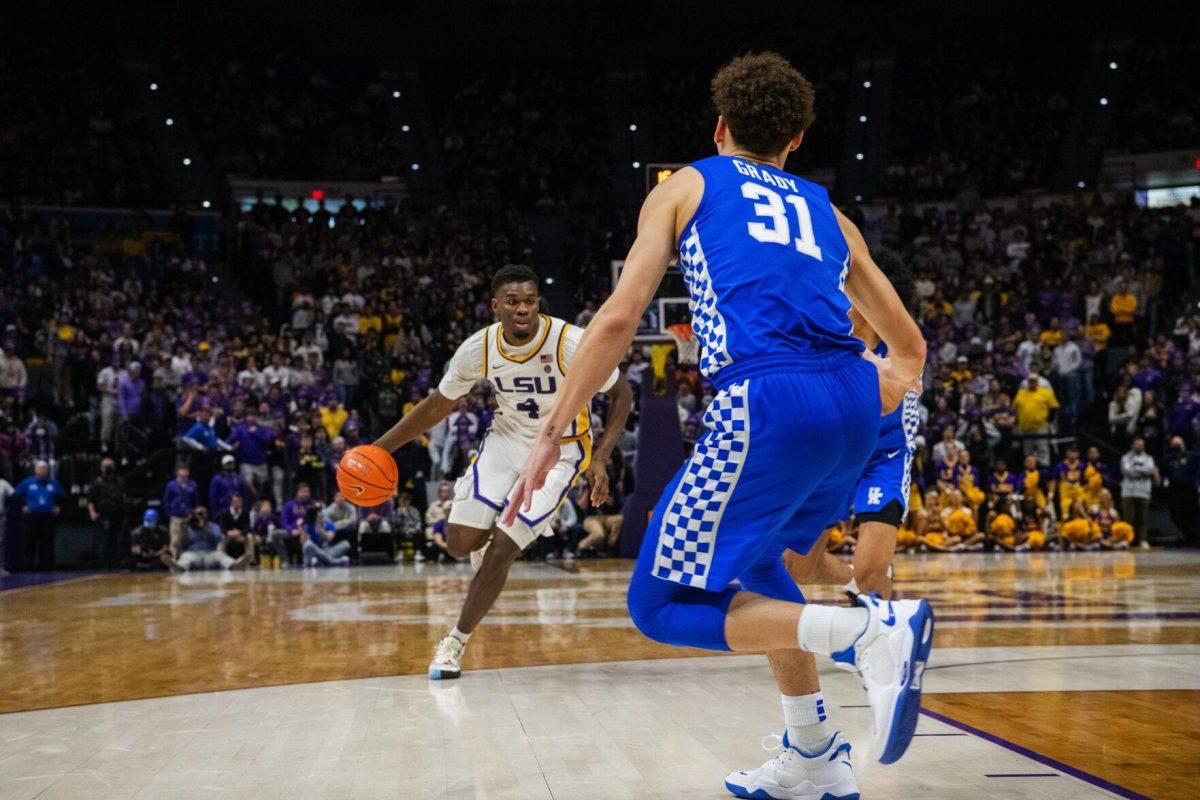 LSU men&#8217;s basketball senior forward Darius Days (4) dribbles the ball Tuesday, Jan. 04, 2022, during LSU&#8217;s 56-50 win against Kentucky in the Pete Maravich Assembly Center on North Stadium Drive in Baton Rouge, La.