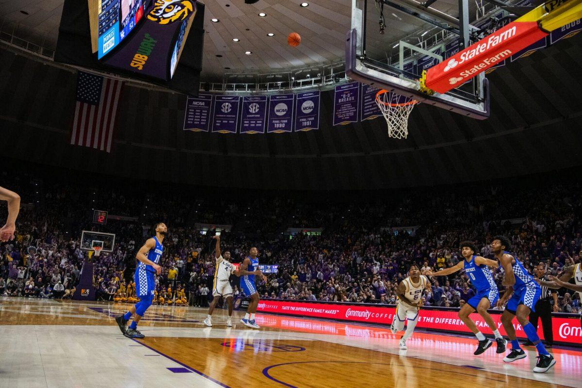 LSU men&#8217;s basketball senior forward Darius Days (4) shoots for three Tuesday, Jan. 04, 2022, during LSU&#8217;s 56-50 win against Kentucky in the Pete Maravich Assembly Center on North Stadium Drive in Baton Rouge, La.