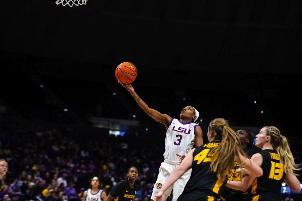 LSU women’s basketball graduate student guard Khayla Pointer (3) goes up for a layup Thursday, Jan. 13, 2022, during LSU’s 87-85 overtime win against Missouri in the Pete Maravich Assembly Center on North Stadium Drive in Baton Rouge, La.
