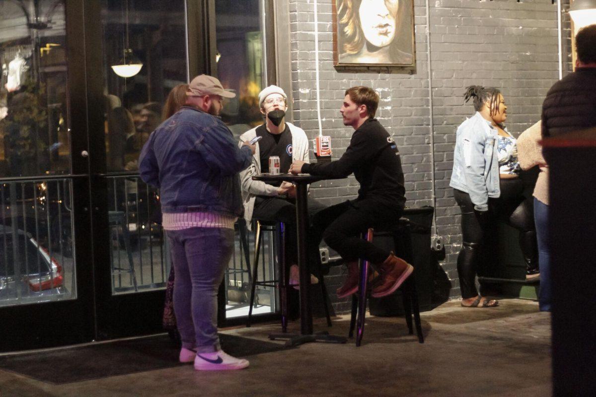 People gather and socialize in the crowd before the performance Saturday, Jan. 15, 2022 at Chelsea's Live Cafe on Nicholson Drive in Baton Rouge, La.