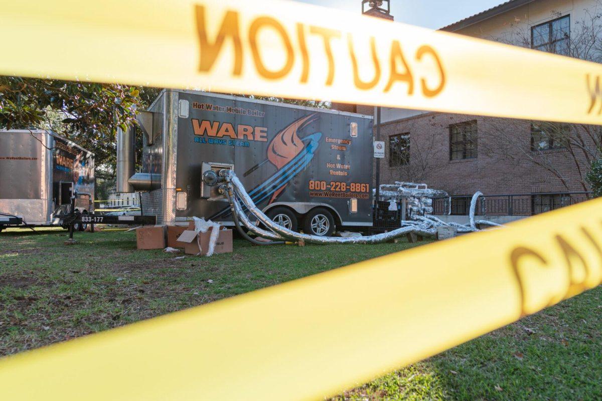 Emergency hot water rental trailers pump hot water on Sunday, Jan. 23, 2022, into South Hall on Cypress Drive in Baton Rouge, La.