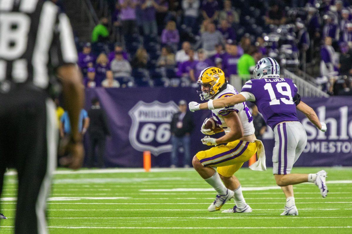 LSU football sophomore tight end Jack Mashburn (82) prepares to take a hit Tuesday, Jan. 4, 2022, during LSU&#8217;s 42-20 loss against Kansas State at NRG Stadium in Houston, TX.