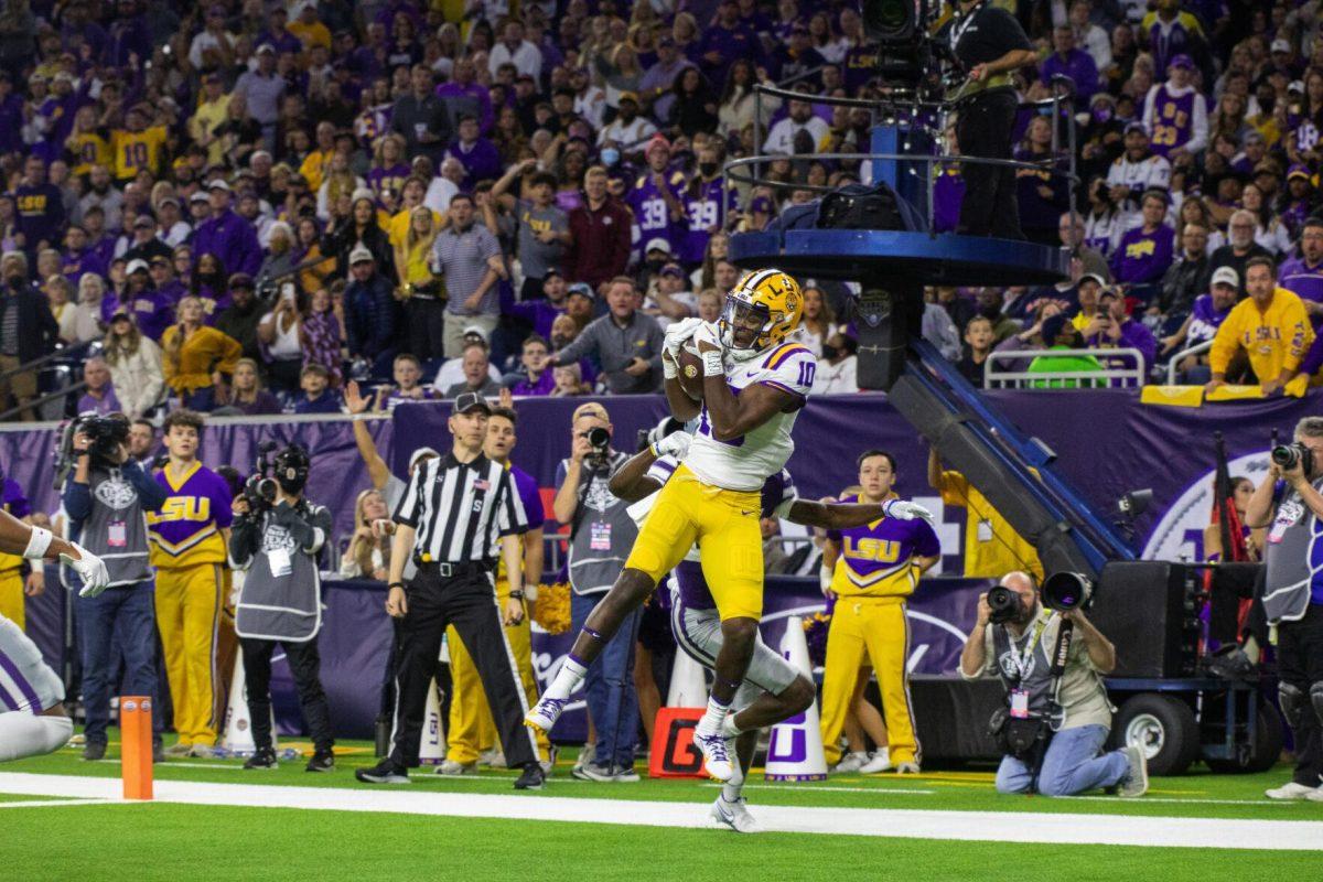 LSU football junior wide receiver Jaray Jenkins (10) scores the first touchdown for LSU Tuesday, Jan. 4, 2022, during LSU&#8217;s 42-20 loss against Kansas State at NRG Stadium in Houston, TX.