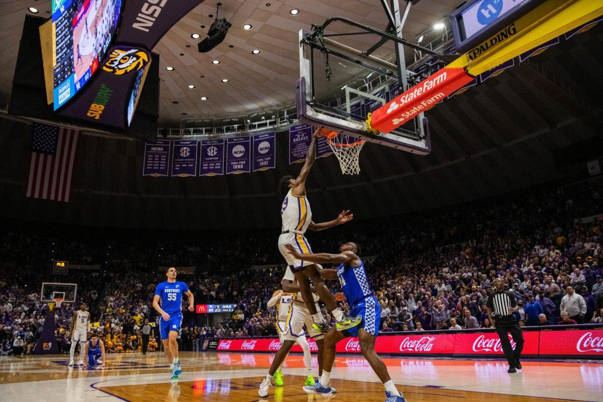 LSU men&#8217;s basketball sophomore forward Tari Eason (13) dunks the ball Tuesday, Jan. 04, 2022, during LSU&#8217;s 56-50 win against Kentucky in the Pete Maravich Assembly Center on North Stadium Drive in Baton Rouge, La.