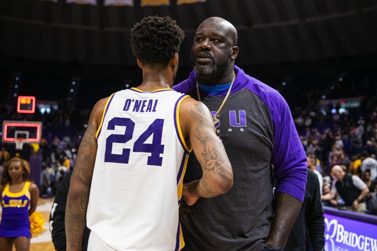 Former LSU basketball player Shaquille O&#8217;Neal talks to his son junior forward Shareef O&#8217;Neal (24) Saturday, Feb. 26, 2022, after LSU&#8217;s 75-55 win against Missouri in the Pete Maravich Assembly Center on North Stadium Drive in Baton Rouge, La.