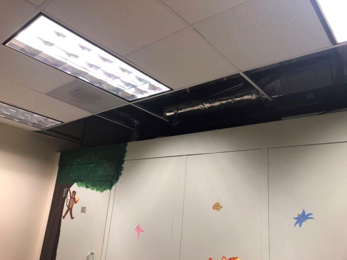 The ceiling of Hatcher Hall room 55 following ceiling leaks from the HVAC system above the room's audiological booth.