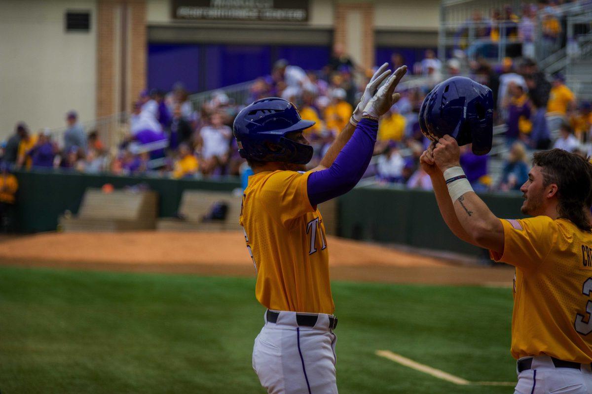 LSU baseball redshirt sophomore outfielder Brayden Jobert (6) celebrates his homerun with sophomore outfielder Dylan Crews (3) Sunday, Feb. 20, 2022 during LSU's&#160;21-6 win against Maine at Alex Box Stadium on Gourrier Avenue in Baton Rouge, La.