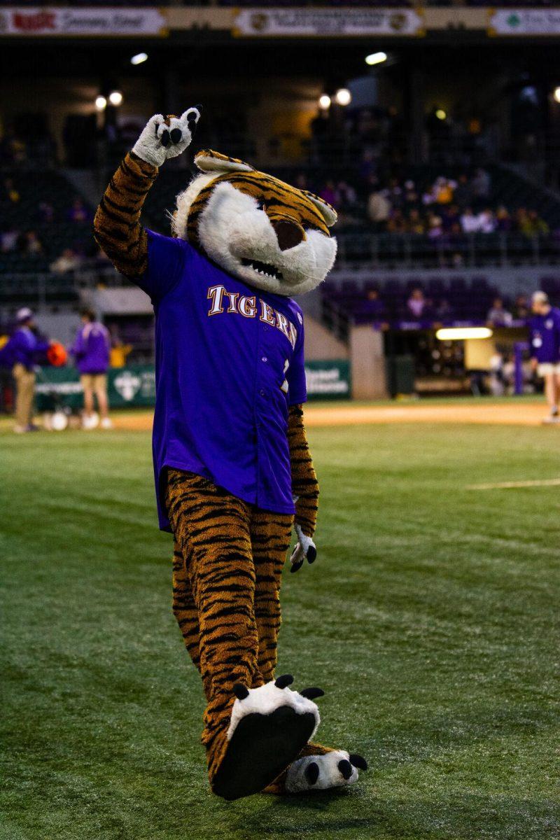 LSU Mike the Tiger poses for a picture Friday, Feb. 18, 2022 before LSU's 13-1 win against Maine at Alex Box Stadium on Gourrier Avenue in Baton Rouge, La.