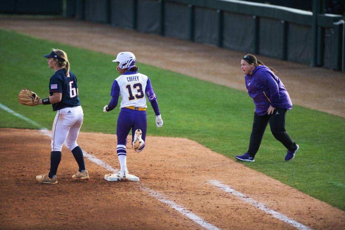 LSU softball sophomore infielder Danieca Coffey (13) safely crosses first base Saturday, Feb. 12, 2022, during LSU’s 8-1 win against South Alabama at Tiger Park on Skip Bertman Drive in Baton Rouge, La.