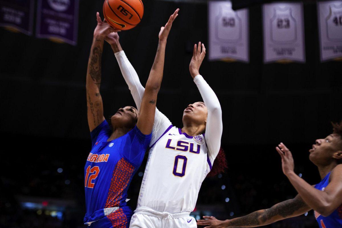 LSU women’s basketball graduate student forward Autumn tries to grab the rebound Sunday, Feb. 20, 2022, during LSU’s 66-61 win against Florida in the Pete Maravich Assembly Center on North Stadium Drive in Baton Rouge, La.