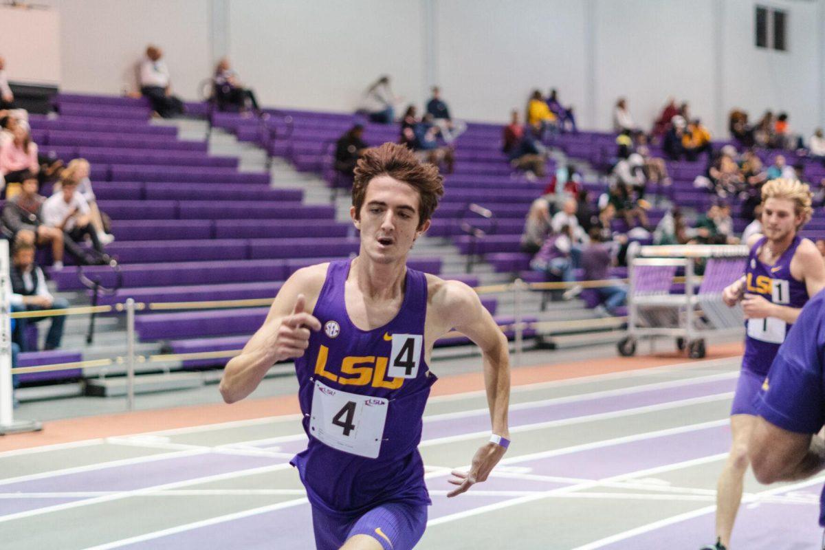 LSU track and field distance sophomore Jackson Martingayle completes a lap on Friday, Feb. 18, 2022, during the LSU Twilight track and field meet in the Carl Maddox Field House on Nicholson Drive in Baton Rouge, La.