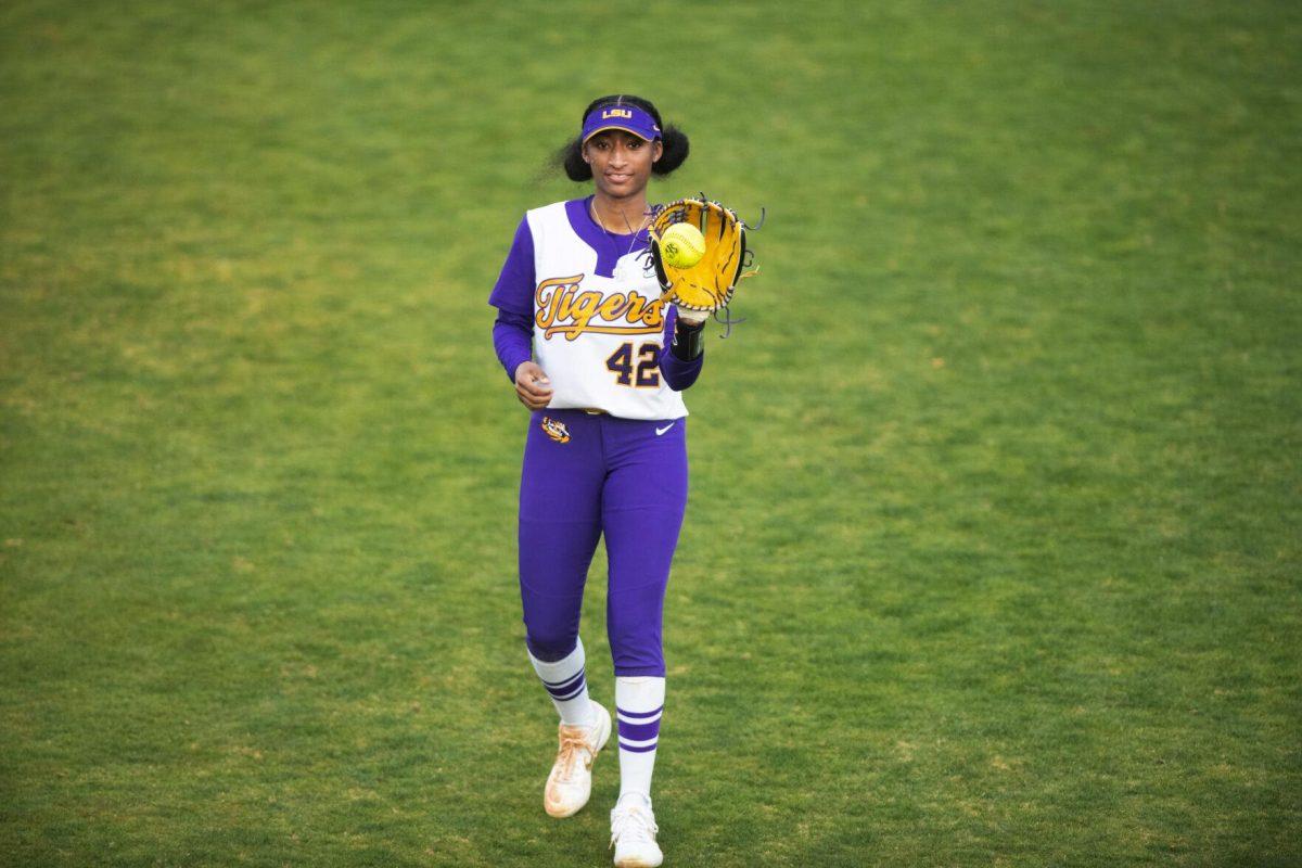 LSU softball freshman utility player Kaylen Madrey (42) catches the ball during pre-inning warmups Saturday, Feb. 12, 2022, during LSU’s 8-1 win against South Alabama at Tiger Park on Skip Bertman Drive in Baton Rouge, La.