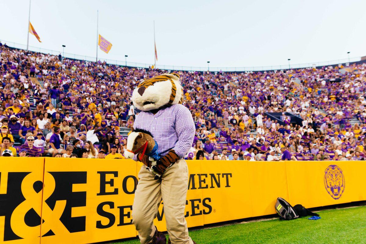 LSU football mascot Mike the Tiger wears a costume and rides a horse down the sidelines Saturday, Sept. 11, 2021, during LSU's 34-7 win against McNeese at Tiger Stadium in Baton Rouge, La.