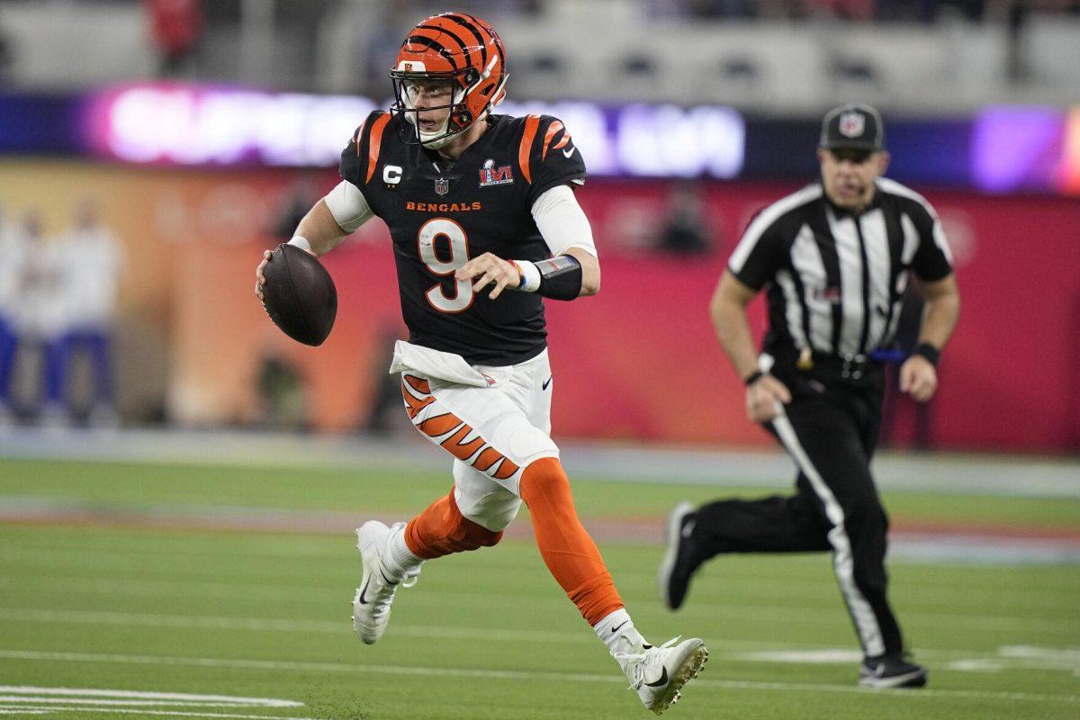 Cincinnati Bengals quarterback Joe Burrow (9) looks to pass against the Los Angeles Rams during the second half of the NFL Super Bowl 56 football game Sunday, Feb. 13, 2022, in Inglewood, Calif. (AP Photo/Lynne Sladky)