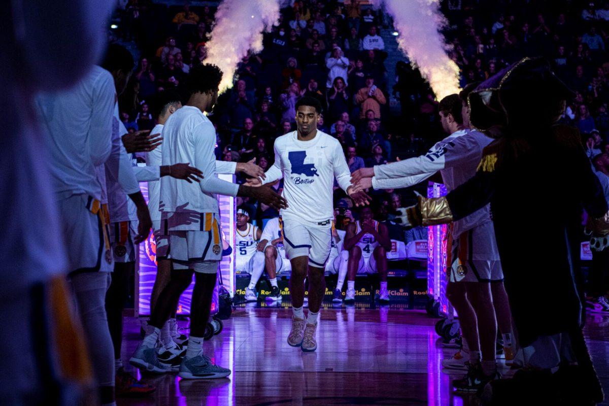 LSU men&#8217;s basketball freshman guard Brandon Murray (0) high fives his teammates Saturday, Feb. 26, 2022, before LSU&#8217;s 75-55 win against Missouri in the Pete Maravich Assembly Center on North Stadium Drive in Baton Rouge, La.