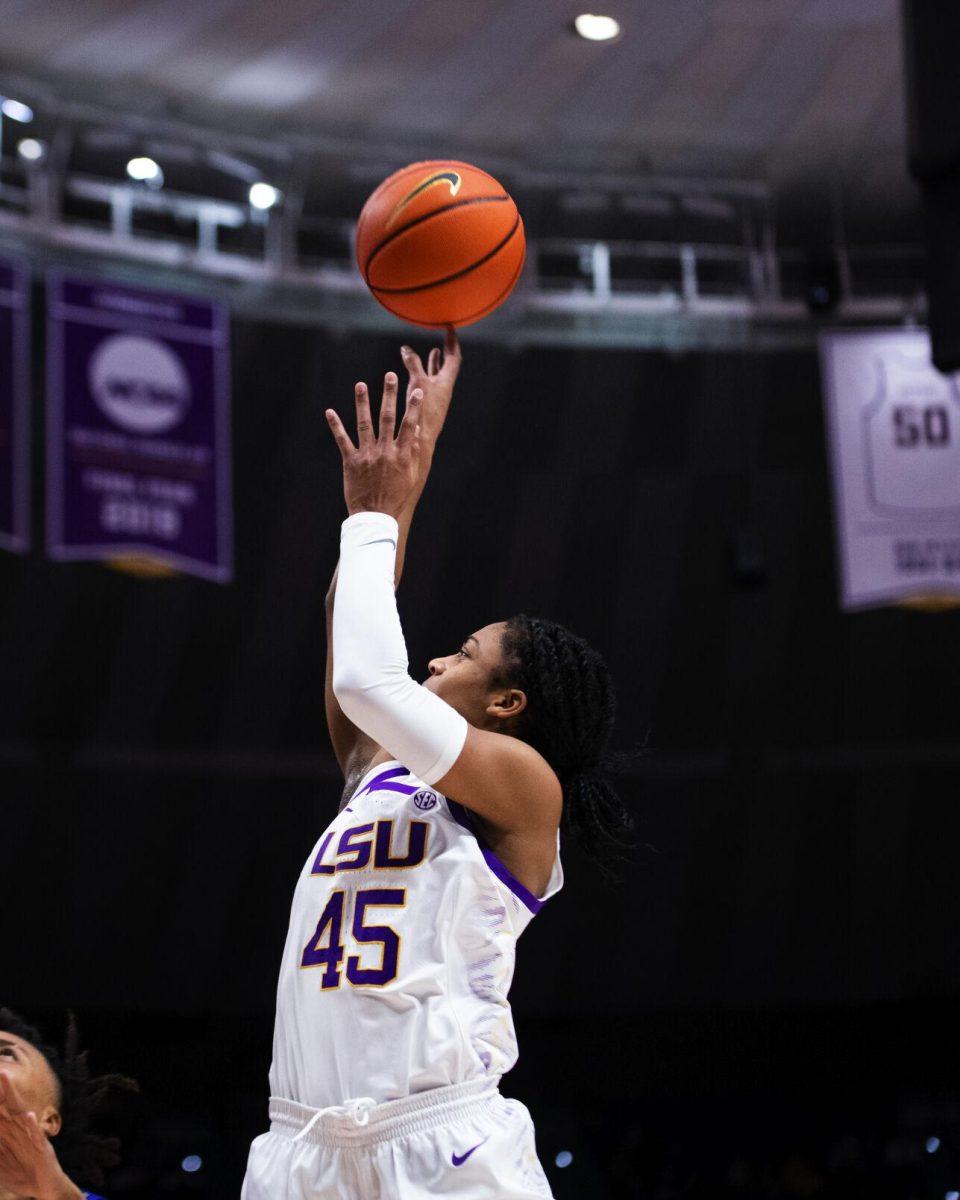 LSU women’s basketball fifth year senior guard Alexis Morris (45) releases the ball Sunday, Feb. 20, 2022, during LSU’s 66-61 win against Florida in the Pete Maravich Assembly Center on North Stadium Drive in Baton Rouge, La.
