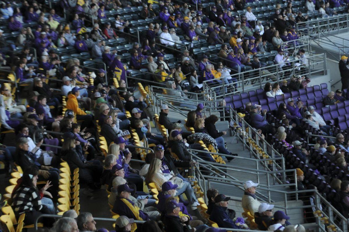 Tiger fans sit and enjoy th game Saturday, Feb. 26, 2022, during the Tigers' 9-2 win against Southern University at Alex Box Stadium in Baton Rouge, La.