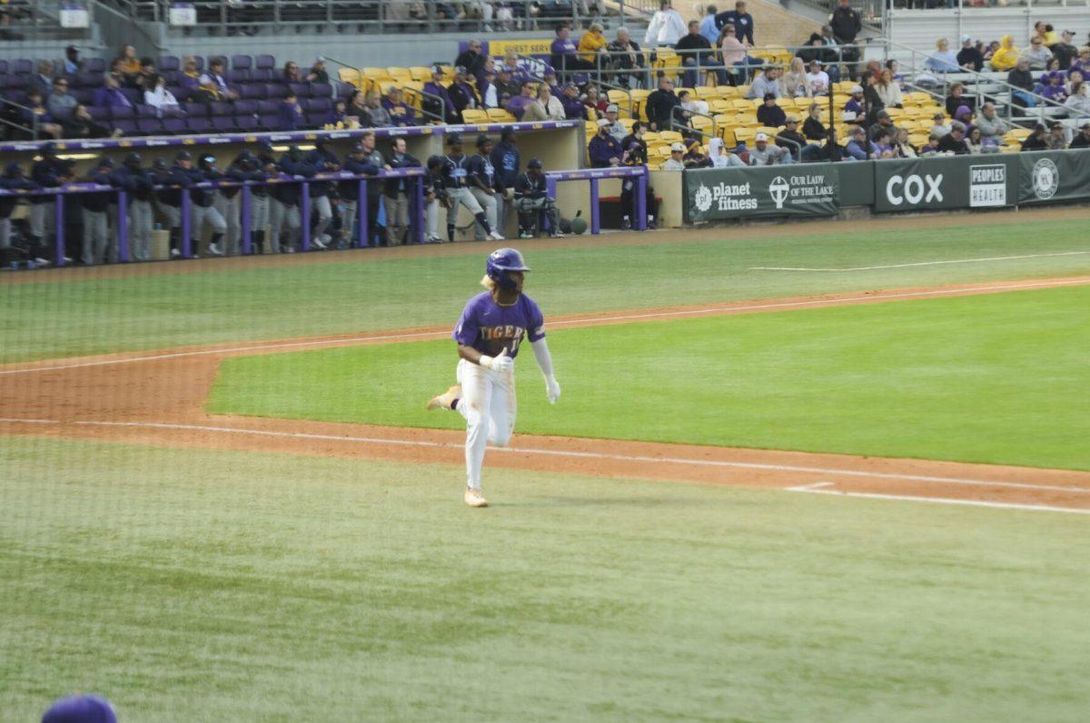 LSU sophomore first basemen Tre' Morgan (18) runs for the double Saturday, Feb. 26, 2022, during the Tigers' 9-2 win against Southern University at Alex Box Stadium in Baton Rouge, La.