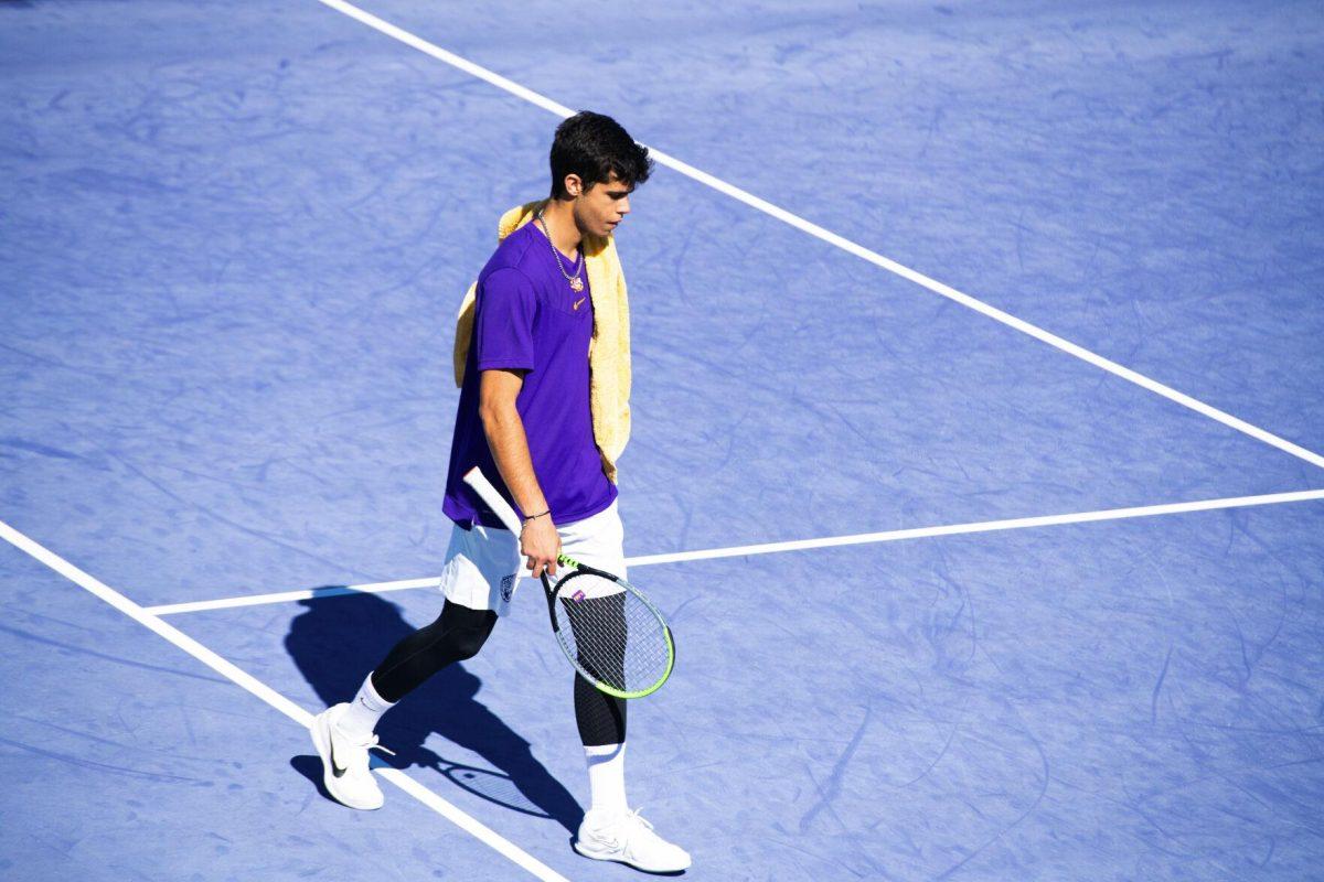 LSU men's tennis sophomore Joao Garca walks on the court Sunday, Feb. 13, 2021 during LSU's 6-1 win over Purdue at the LSU Tennis Complex on Gourrier Avenue in Baton Rouge, La.