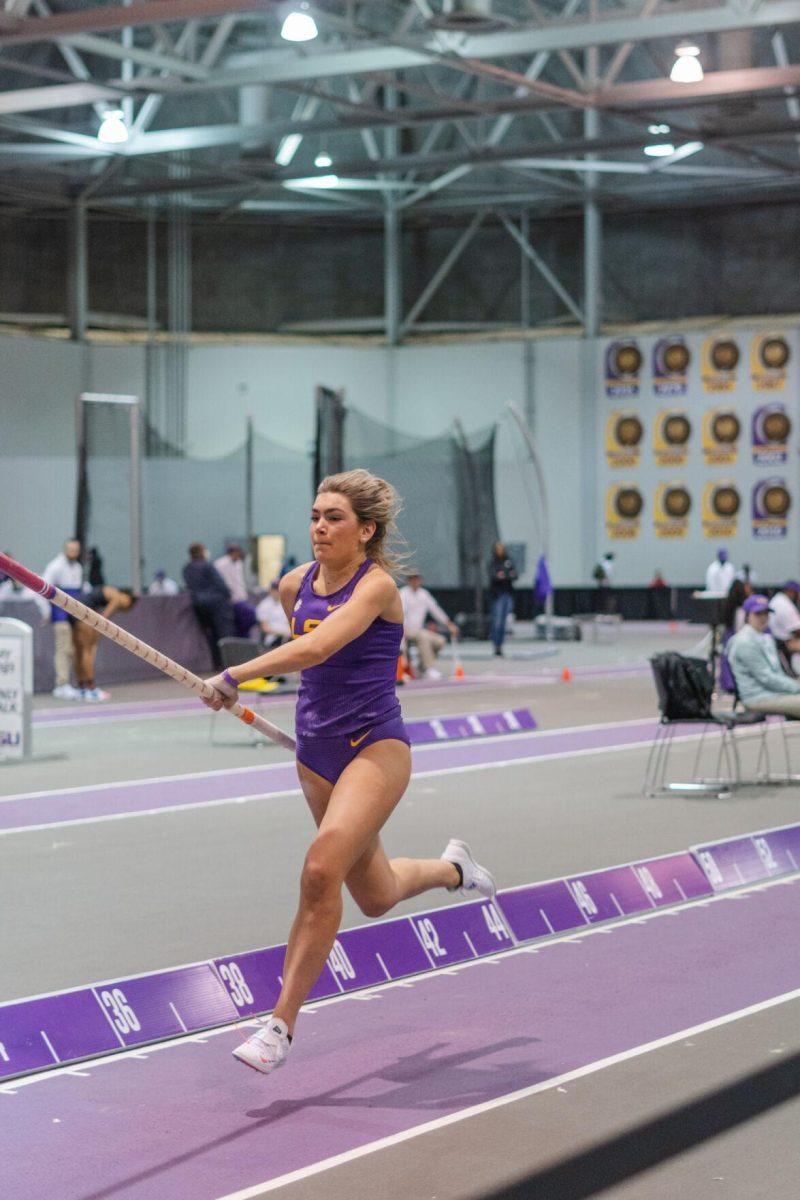 LSU track and field freshman Johanna Duplantis begins to lower her pole on Friday, Feb. 4, 2022, during the Bayou Bengal indoor track meet at the Carl Maddox Field House on Nicholson Drive in Baton Rouge, La.