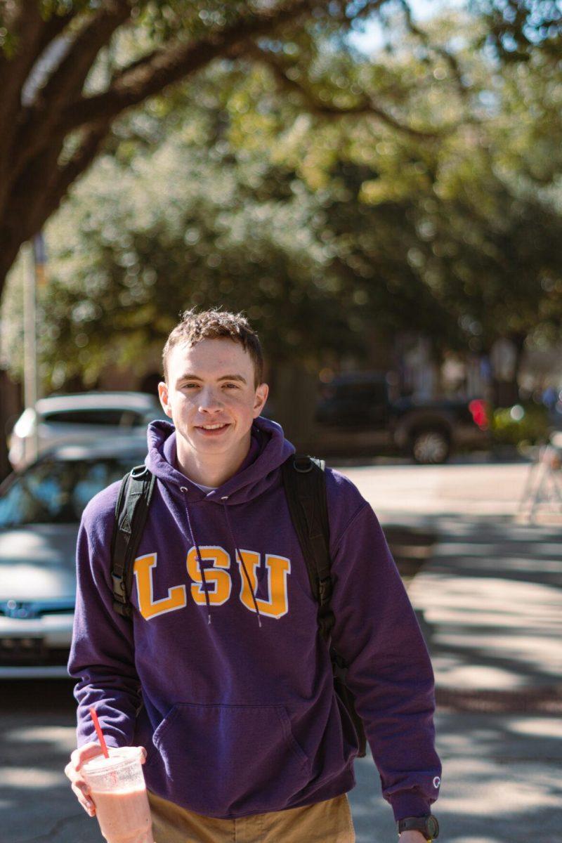 LSU sophomore general business major Max Collins wears an LSU sweatshirt on Tuesday, Feb. 8, 2022, near the East Campus Apartments on Veterans Drive in Baton Rouge, La.