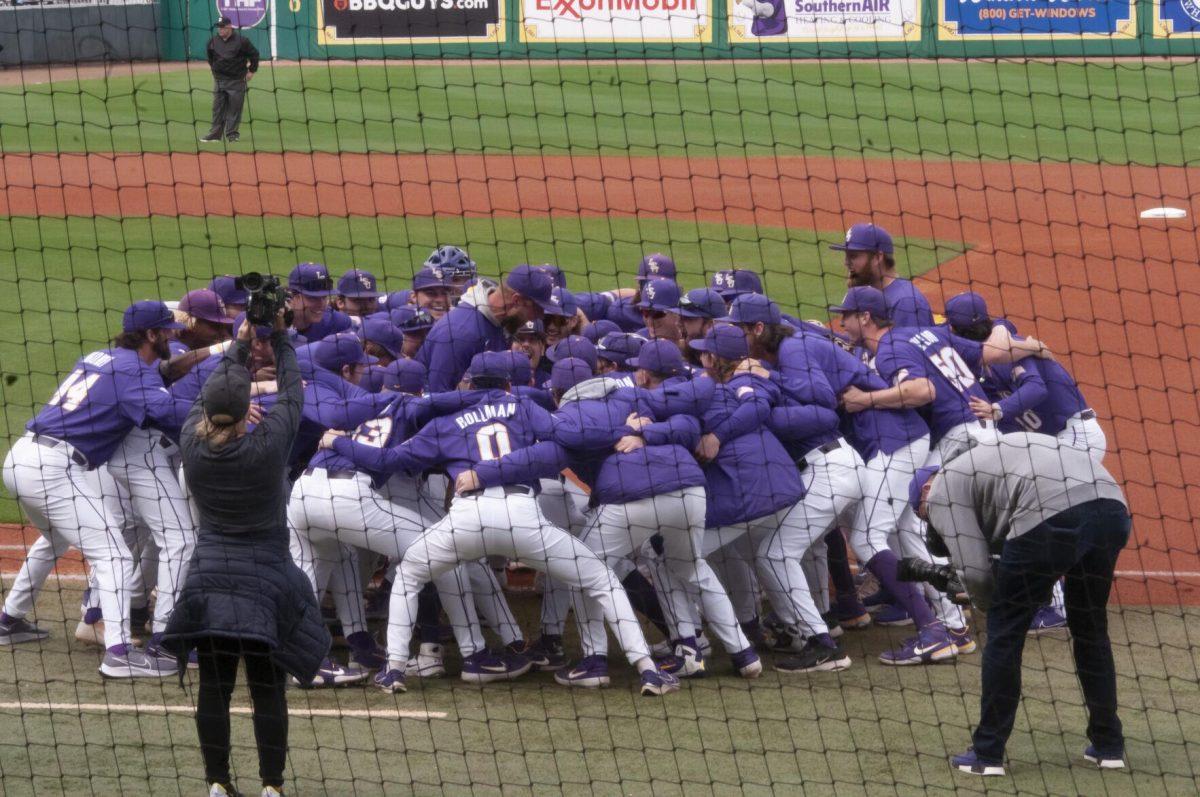 The LSU baseball team gets hype during pregame Saturday, Feb. 26, 2022, during the Tigers' 9-2 win against Southern University at Alex Box Stadium in Baton Rouge, La.