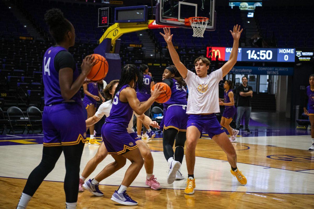 Dream Team Luke LeGoullon and Jacob Skwira guard LSU women&#8217;s basketball 5th-year senior guard Alexis Morris (45) Wednesday, Feb. 9, 2022 during the LSU women&#8217;s basketball team in the Pete Maravich Assembly Center on N. Stadium Drive in Baton Rouge, La.