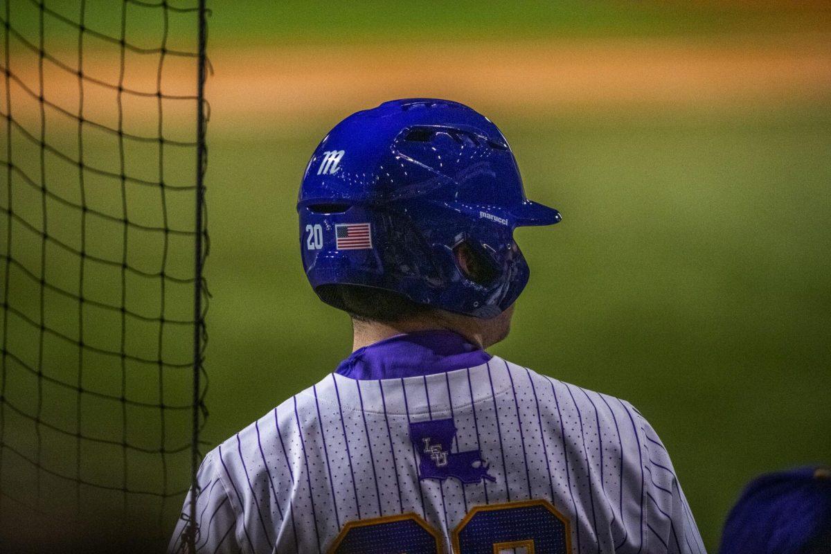 LSU baseball redshirt sophomore catcher Alex Millazo (20) waits for his at bat Friday, Feb. 18, 2022 during LSU's 13-1 win against Maine at Alex Box Stadium on Gourrier Avenue in Baton Rouge, La.