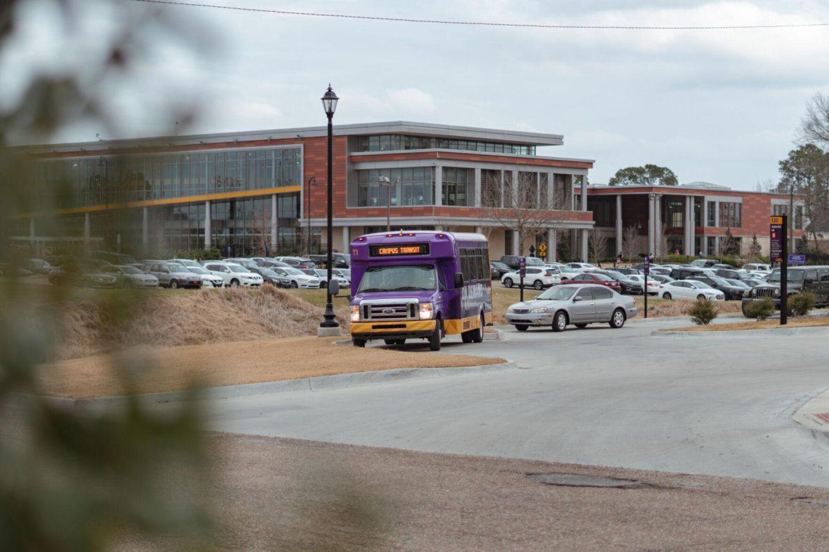 An LSU shuttle sits in the parking lot on Wednesday, Feb. 16, 2022, of Azalea Hall on South Campus Drive in Baton Rouge, La.