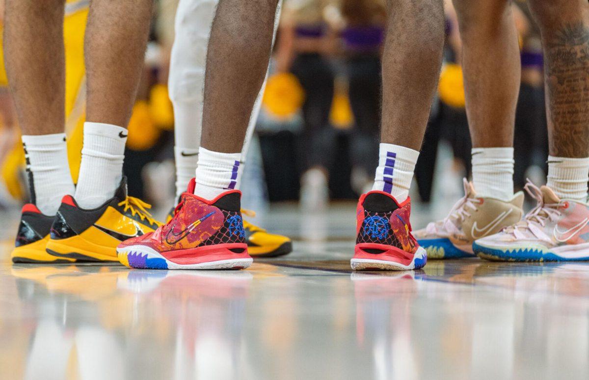 The LSU men&#8217;s basketball team huddles on the court on Saturday, Feb. 12, 2022, during LSU&#8217;s 69-65 win over Mississippi State in the Pete Maravich Assembly Center on North Stadium Drive in Baton Rouge, La.