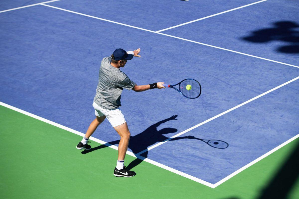 LSU men's tennis junior Boris Kozlov hits the ball Sunday, Feb. 13, 2021 during LSU's 6-1 win over Purdue at the LSU Tennis Complex on Gourrier Avenue in Baton Rouge, La.