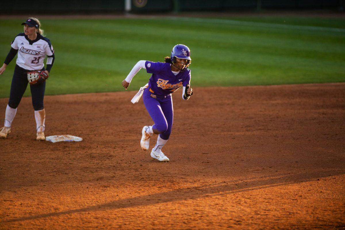 LSU softball freshman utility KK Madrey (42) runs Friday, Feb. 11, 2022, during the Tigers' 3-0 win against South Alabama at Tiger Park in Baton Rouge, La.