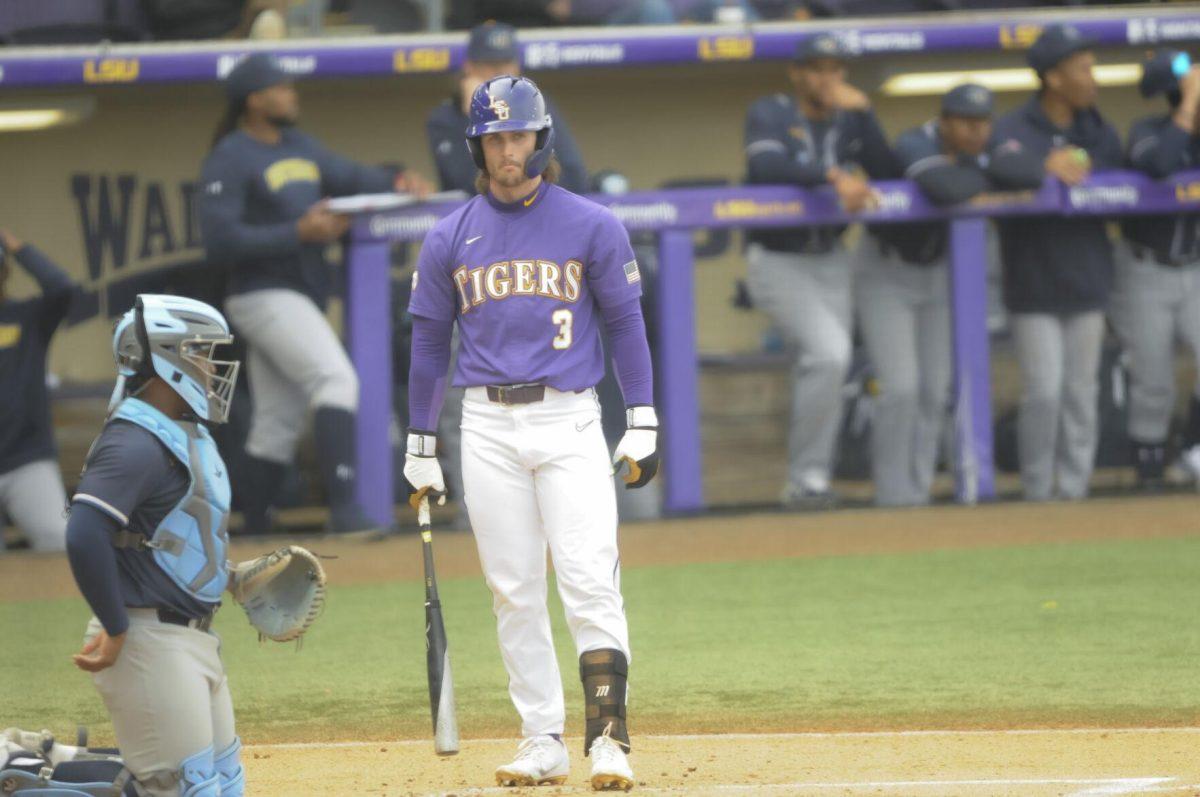 LSU sophomore outfielder Dylan Crews (3) stands at home plate Saturday, Feb. 26, 2022, during the Tigers' 9-2 win against Southern University at Alex Box Stadium in Baton Rouge, La.