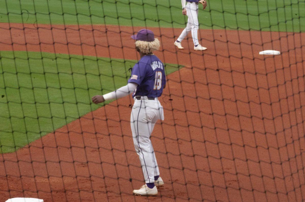 LSU sophomore first basemen Tre' Morgan (18) gets ready during pregame Saturday, Feb. 26, 2022, during the Tigers' 9-2 win against Southern University at Alex Box Stadium in Baton Rouge, La.