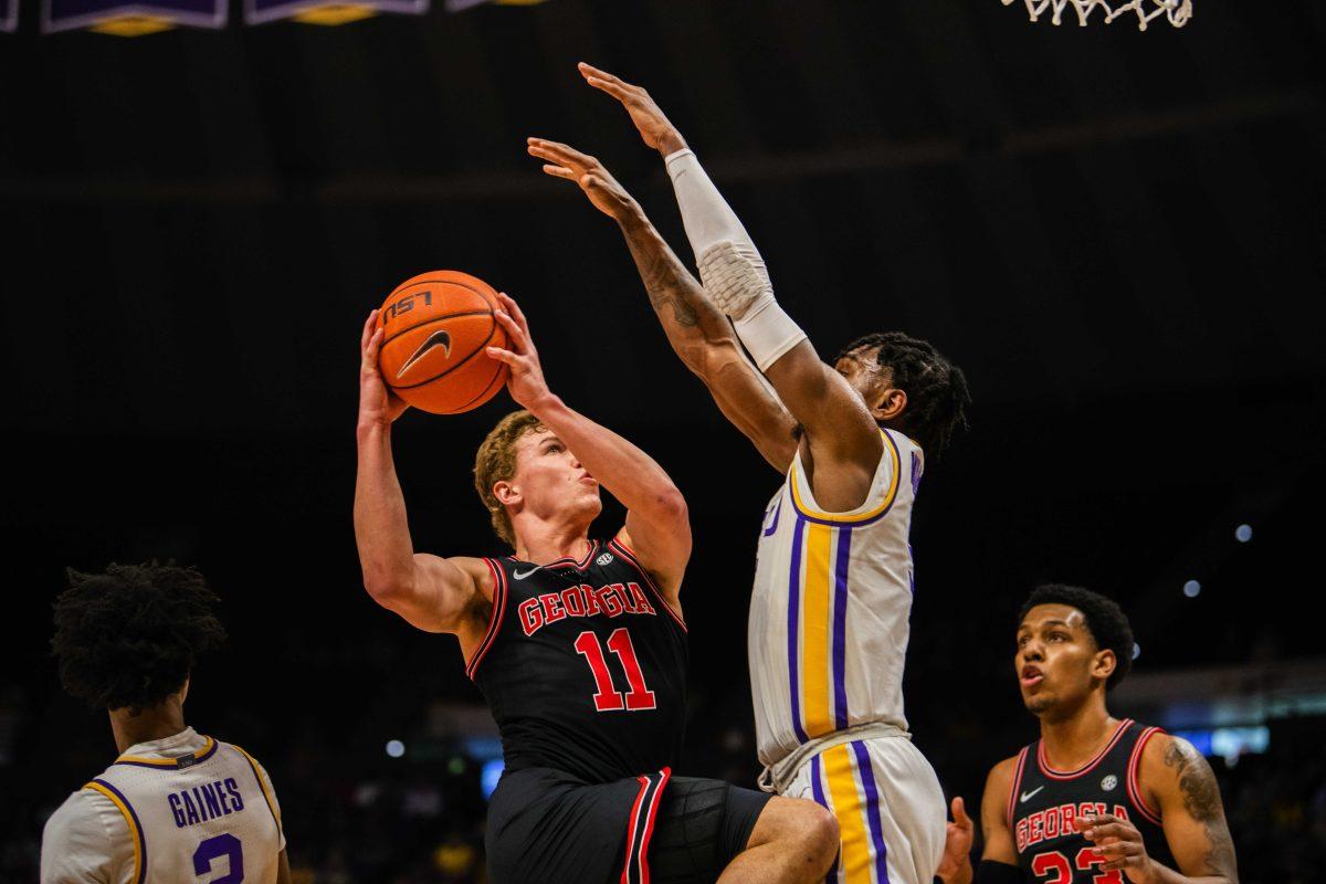 LSU men&#8217;s basketball sophomore forward Mwani Wilkinson (5) defends a Georgia player during LSU&#8217;s 84-65 win against Georgia in the Pete Maravich Assembly Center on North Stadium Drive in Baton Rouge, La.