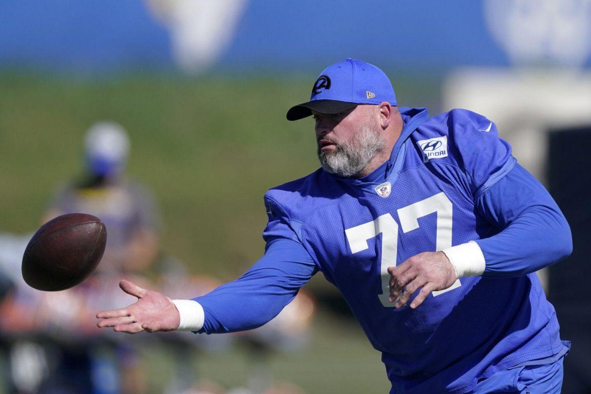 Los Angeles Rams offensive tackle Andrew Whitworth warms up during practice for an NFL Super Bowl football game Wednesday, Feb. 9, 2022, in Thousand Oaks, Calif. The Rams are scheduled to play the Cincinnati Bengals in the Super Bowl on Sunday. (AP Photo/Mark J. Terrill)