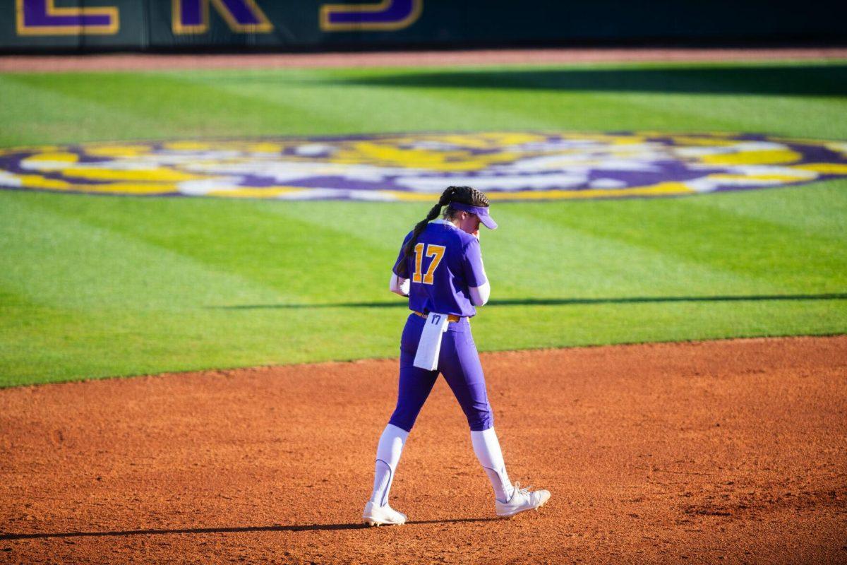 LSU softball redshirt sophomore infielder Taylor Pleasants (17) walks to her position Friday, Feb. 11, 2022, during the Tigers' 3-0 win against South Alabama at Tiger Park in Baton Rouge, La.