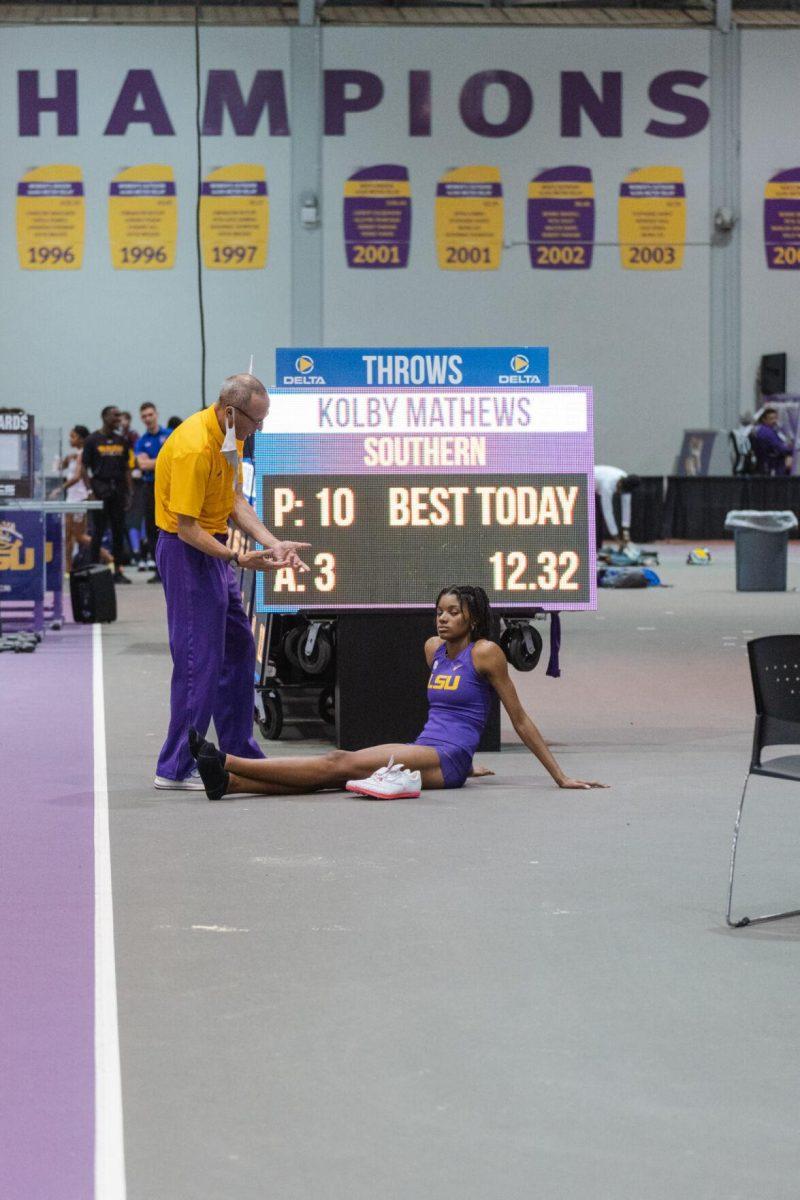 LSU track and field sophomore Morgan Smalls listens to her coach on Friday, Feb. 4, 2022, after her event during the Bayou Bengal indoor track meet at the Carl Maddox Field House on Nicholson Drive in Baton Rouge, La.