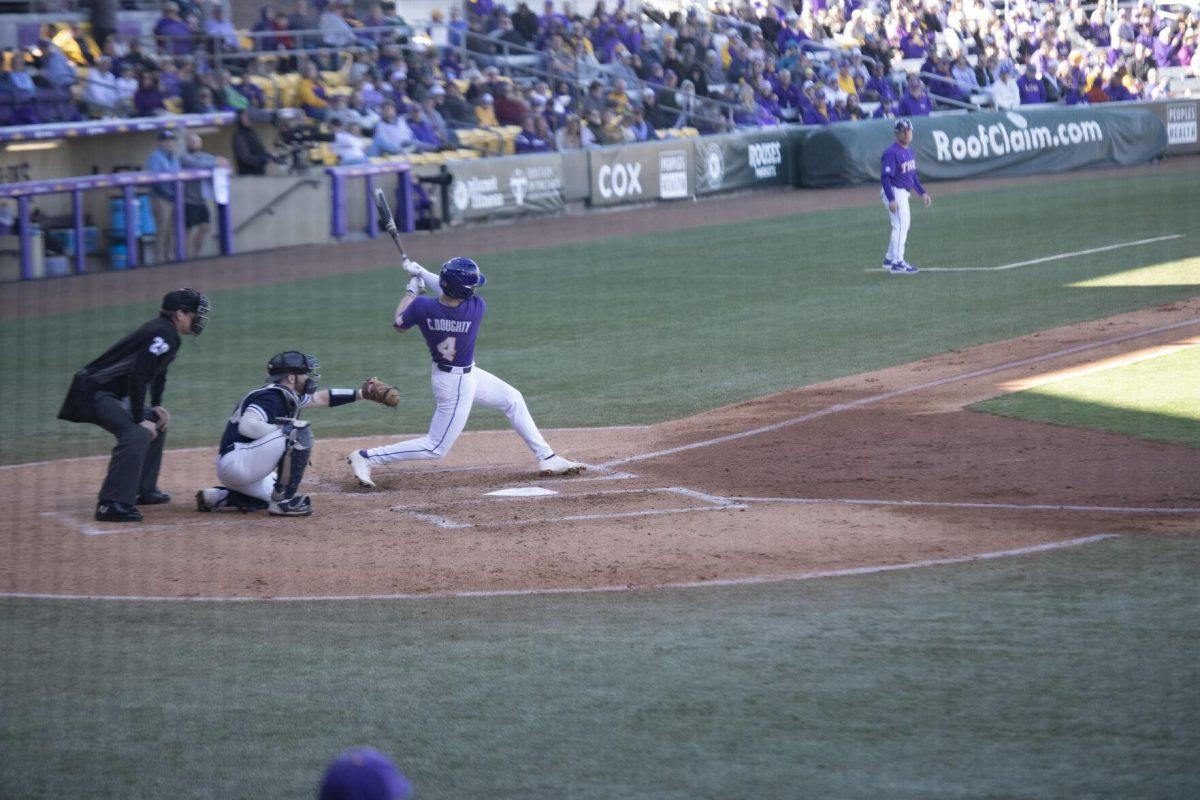 LSU sophomore infielder Cade Doughty (4) swings at bat Saturday, Feb. 19, 2022, during the Tigers' 17-8 win against the University of Maine at Alex Box Stadium in Baton Rouge, La.